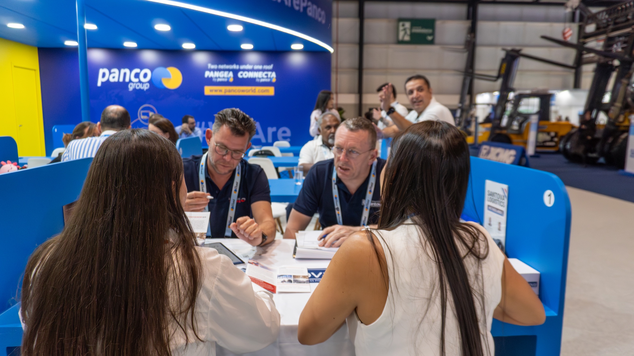 Freight forwarders holding business meetings at the PANCO booth